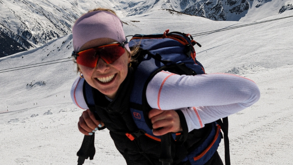 Biathlete Johanna Puff smiles at the camera during training