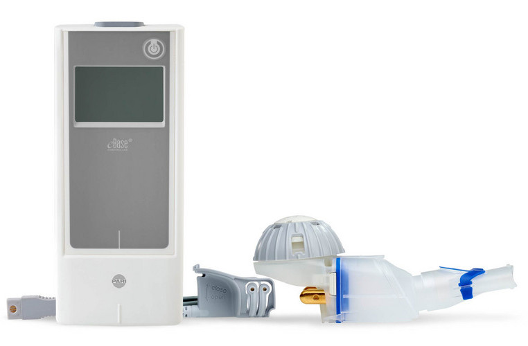 eFlow and eBase Controller A disassembled white and gray medical device with a screen is on a white background.