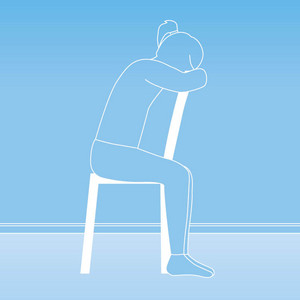 Schematic representation of a person sitting upside down on a chair with head and arms resting on the backrest