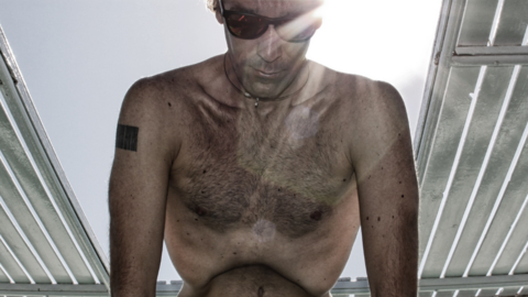 Freediver Nik Linder: How I train my lungs Man leans against the edge of the pool, concentrating on his breathing
