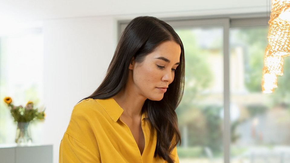 Young woman breathes relaxed