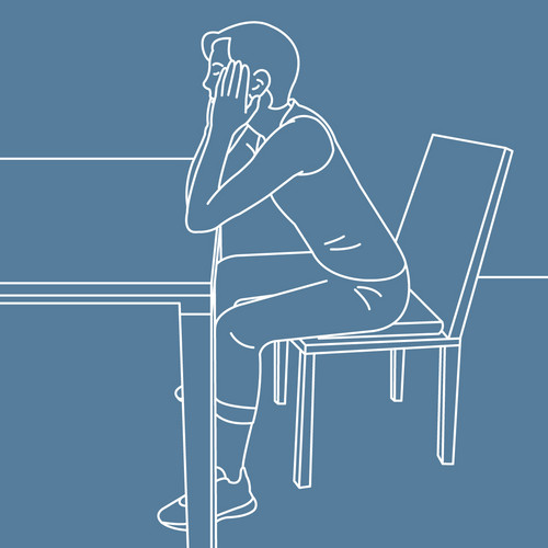 Graphic depiction of a person sitting on a chair, arms propped on the table in front of them, head in hands