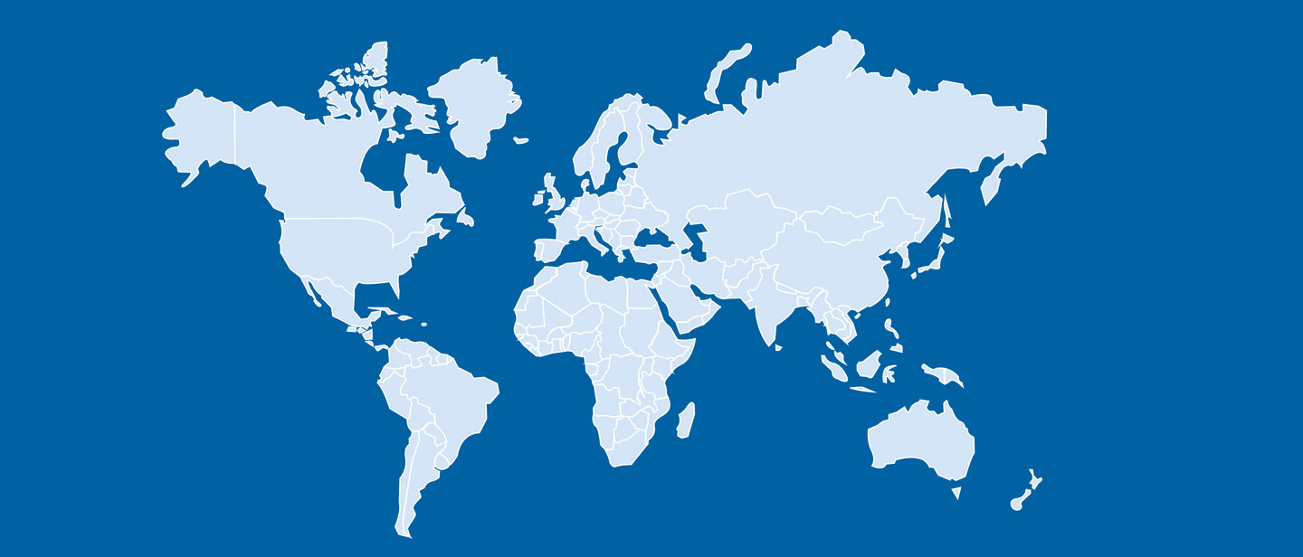 A light-coloured world map showing simplified outlines of the continents on a blue background.